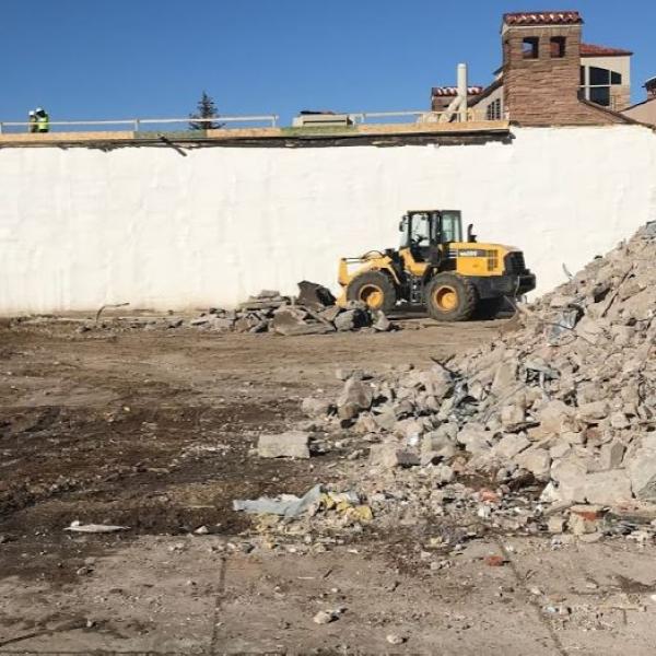 Spray foam will be applied in on this wall, separating Grusin Hall from the construction site