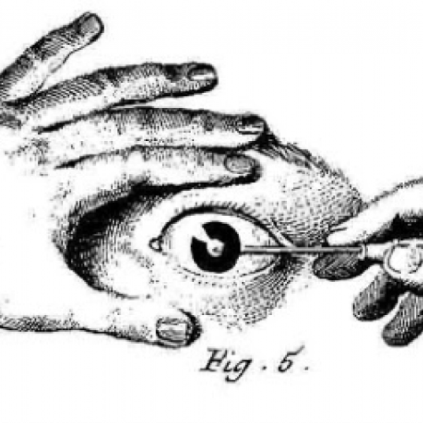 image of a hand painting its own eye