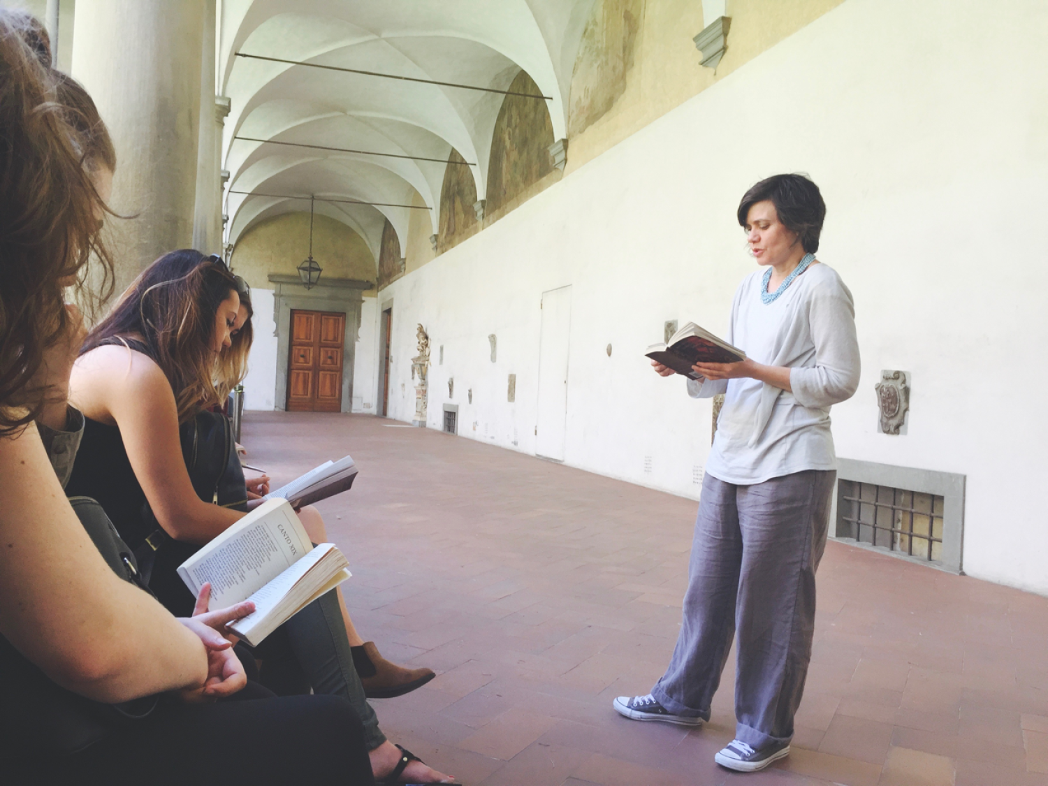 Professor Suzanne Magnanini speaking to her study abroad class in Italy
