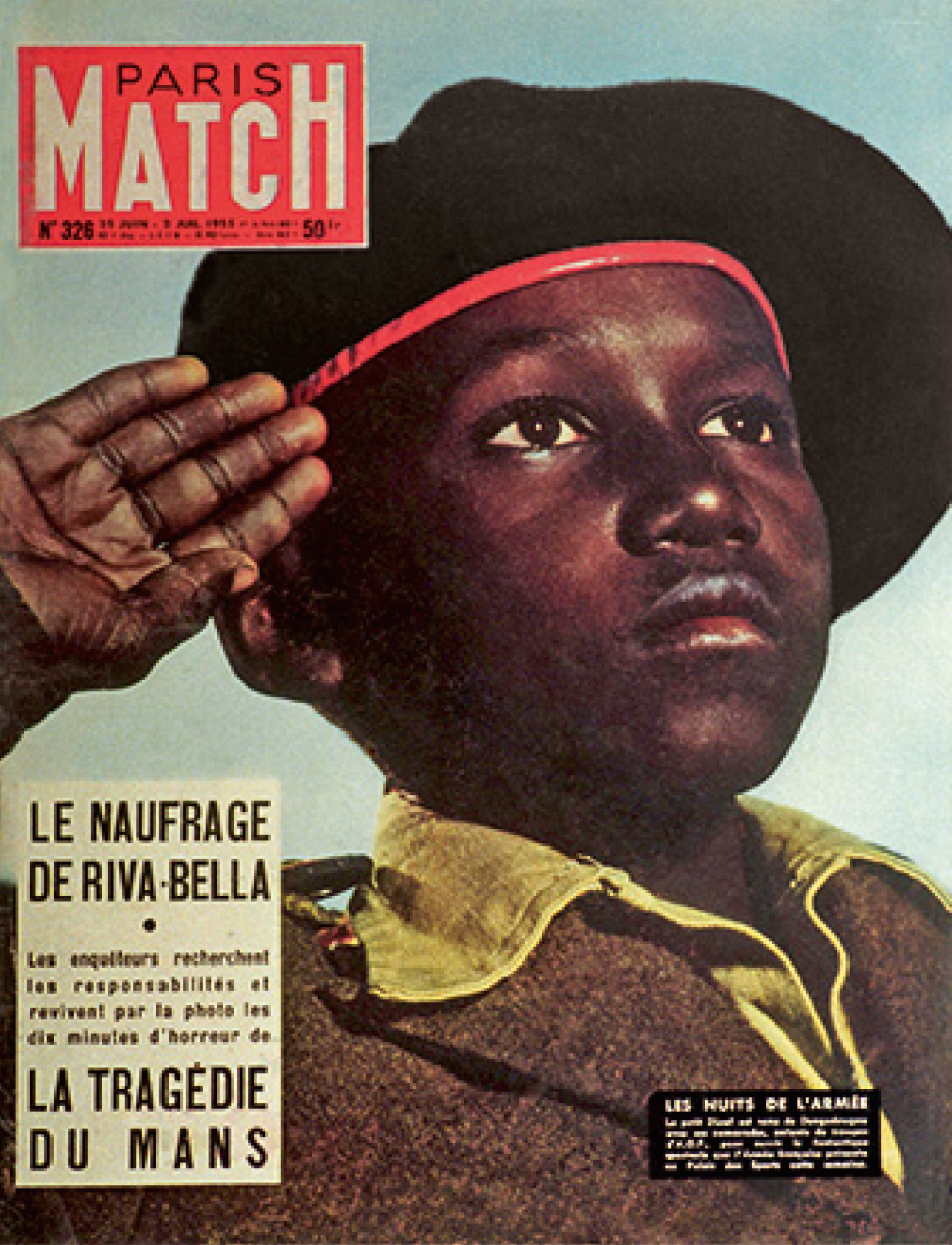 Picture of a Paris magazine cover that shows a young black person saluting