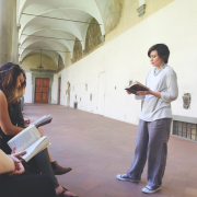 Professor Suzanne Magnanini speaking to her study abroad class in Italy