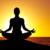 graphic of a person sitting doing a yoga pose