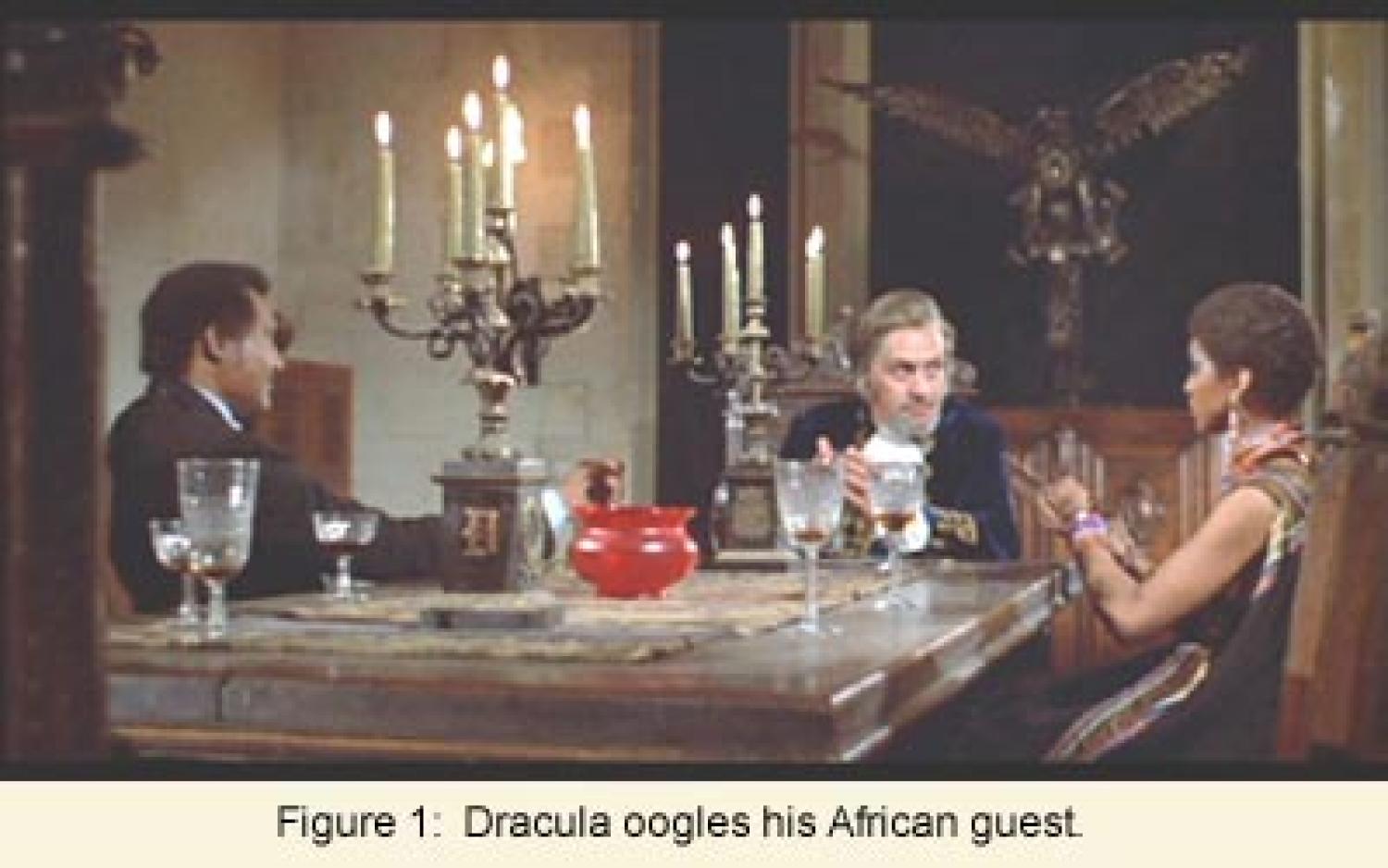 Figure 1: Dracula oogles his African guest. Dracula, a white bearded man, ogles a beautiful African woman sitting at his dining table in a dark, Gothic hall.
