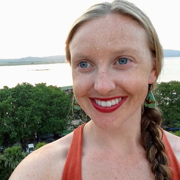 Shae Frydenlund standing in front of river