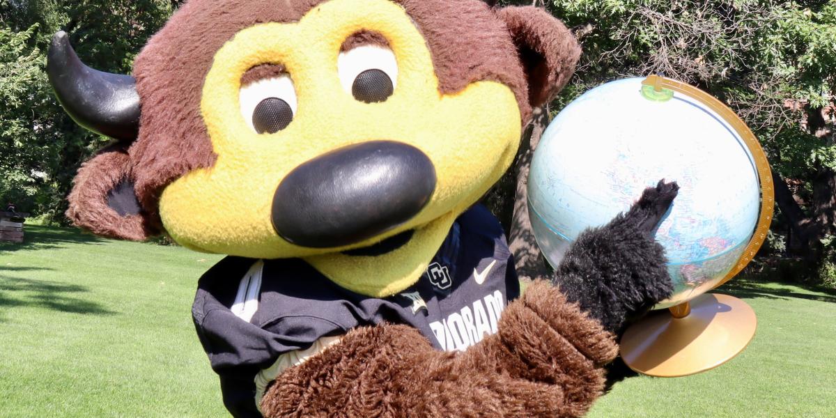 Chip Holding a Globe