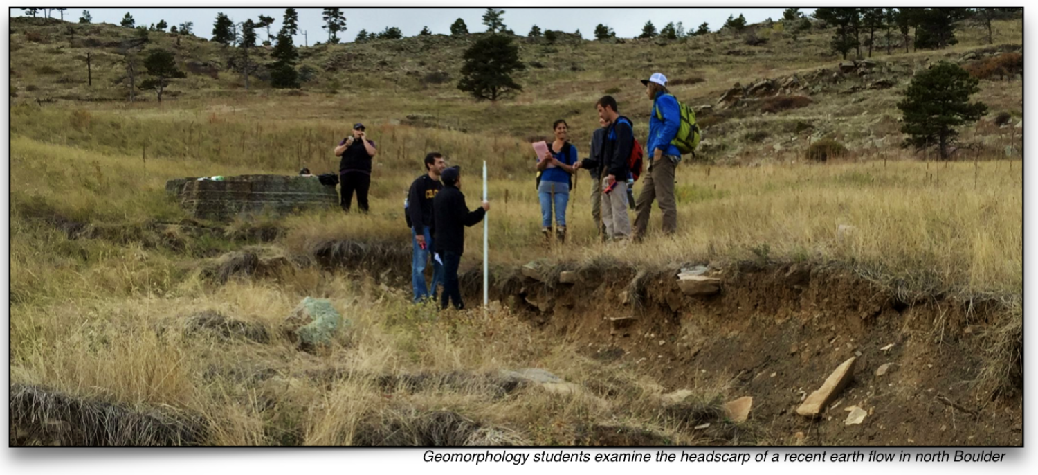 Geomorphology students examine the headscarp of a recent earth flow in north Boulder