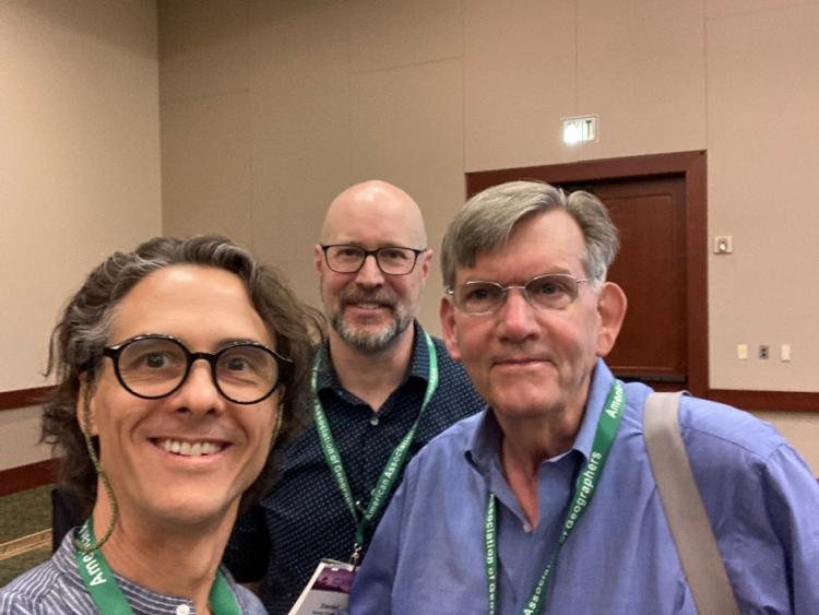 Chris (left), with Dan Trudeau (PhD, CU-Boulder) and Ken Foote (former faculty CU-Boulder) at the 2024 AAG meetings