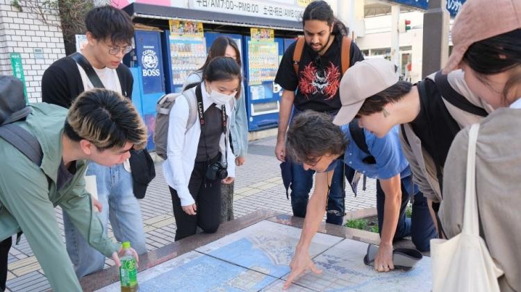 Chris in the field with students in Fukuoka, Japan