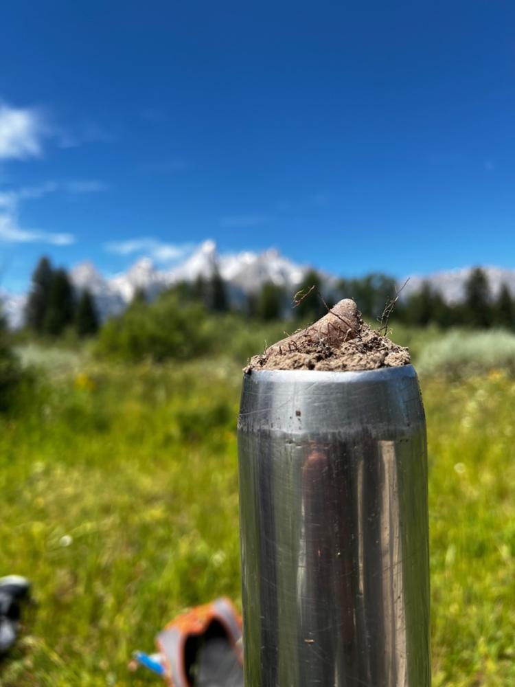 Picture 2: One of nearly 400 soil cores collected on the Snake River between Summer 2023 and Summer 2024. We would collect cores down to a 1 meter depth or depth of refusal, if refusal was less than 1 meter in depth. The depth of refusal is where coarse alluvium begins; this core was the last sample collected at this site, as indicated by the pebble sticking out of the core.