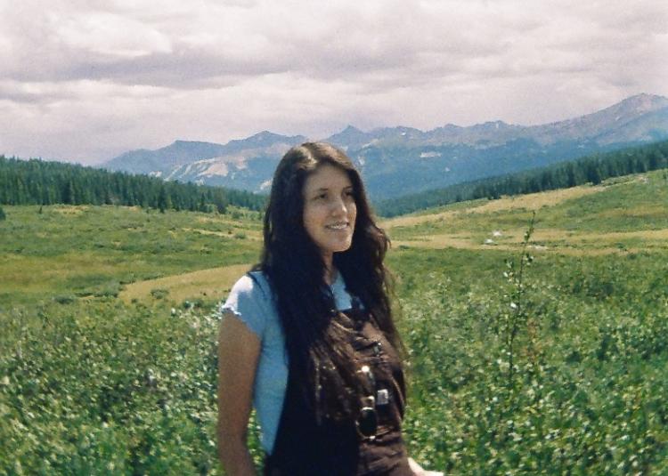 Woman in mountain landscape