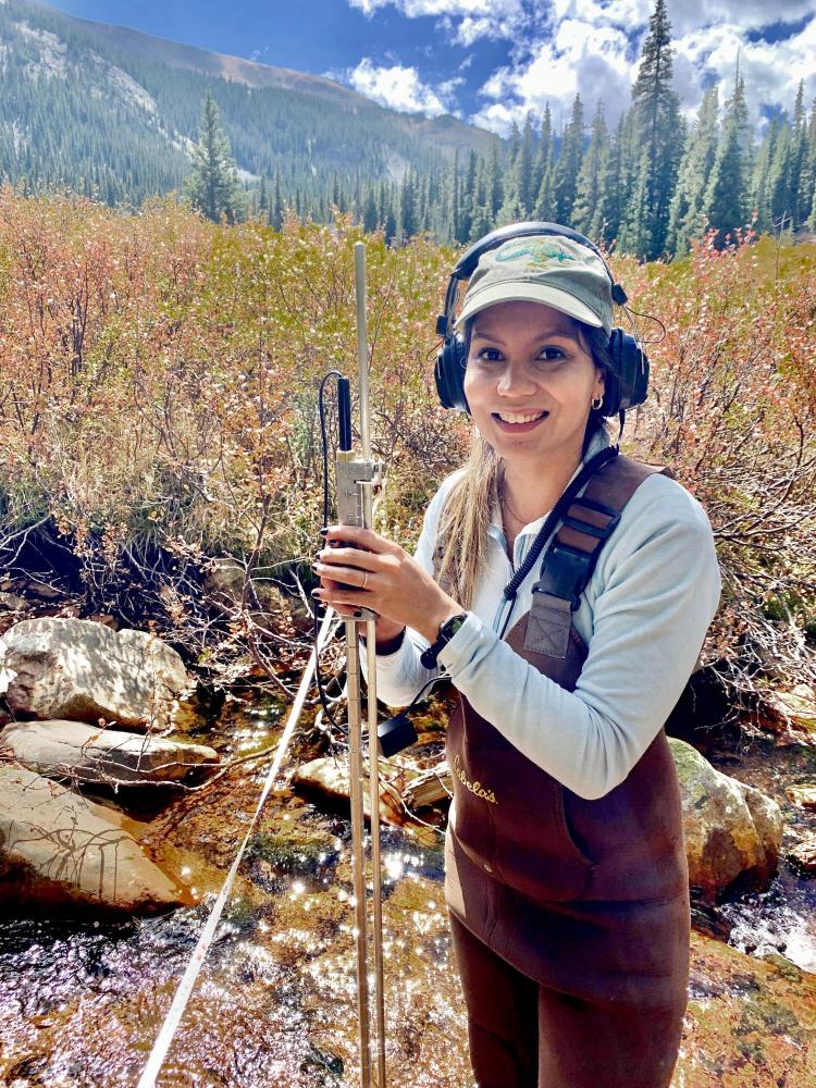 Katarena Matos doing field work