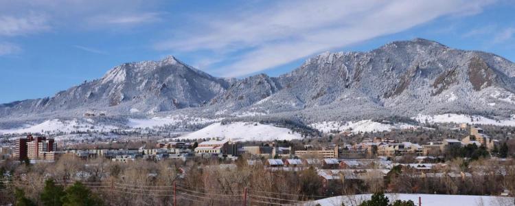Aerial view of CU Boulder campus with snow