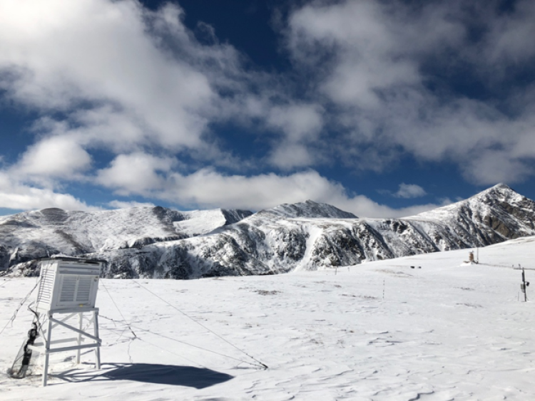 Snow covered mountain scene