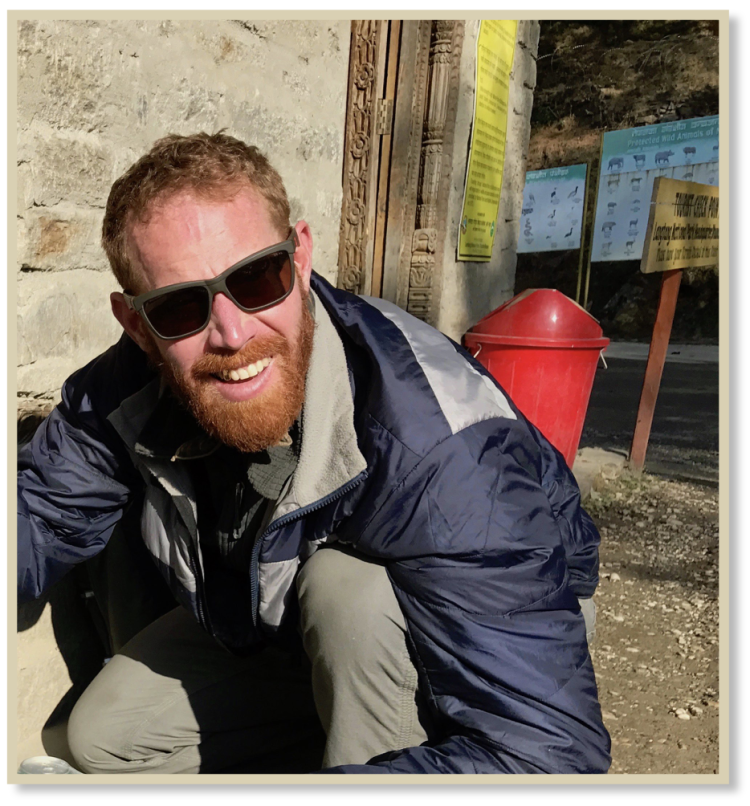 Galen packs his backpack in Langtang at the check-post of Langtang National Park in Rasuwa District (Nepal).