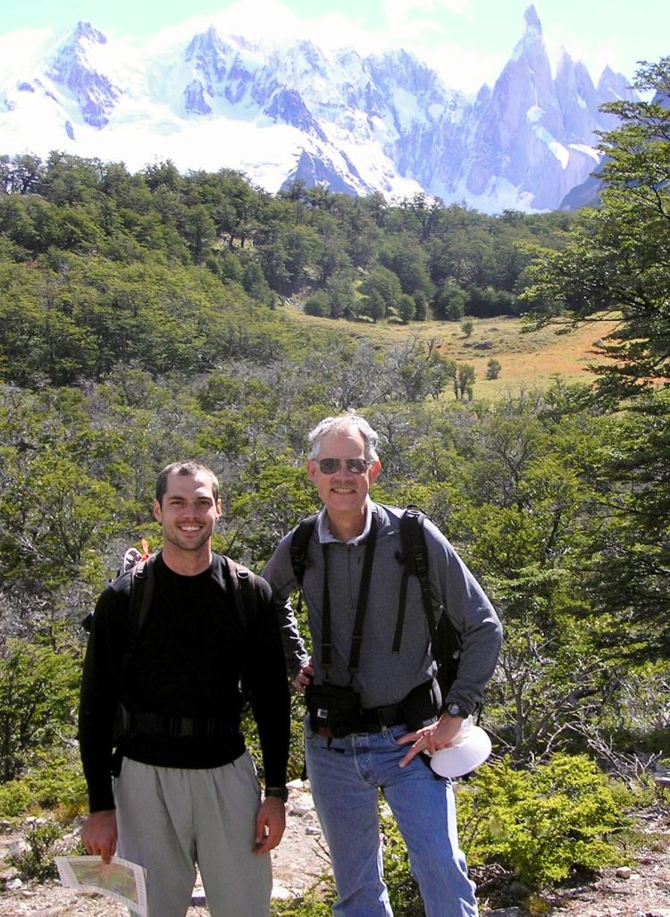 2 men posing in front of mountain landscape in Argentina