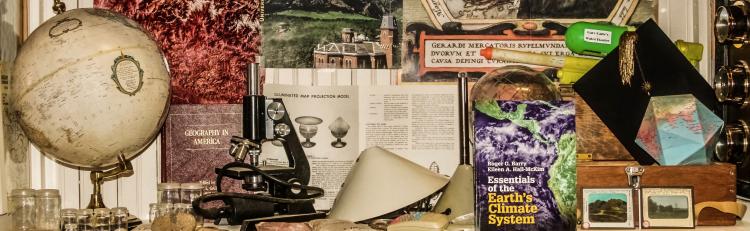 Guggenheim museum case with numerous geography artifacts