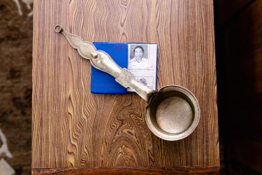 Nepalese cup with photograph of man