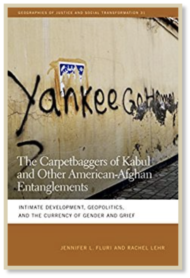 Book cover with graffiti that says "Yankee Go Home"