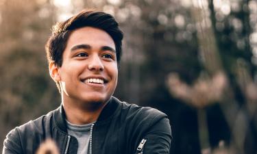 Dark-haired man smiling