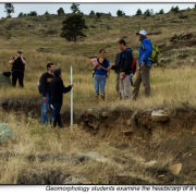 Geomorphology students examine the headscarp of a recent earth flow in north Boulder