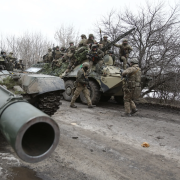 Ukrainian servicemen get ready to repel an attack in Ukraine's Lugansk region on February 24, 2022.  ANATOLII STEPANOV