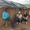 Posner and her Research Assistant, Noor Hussein Noor, piloting the questionnaire with a Samburu pastoralist at his manyatta (homestead) March 2025.