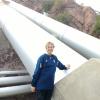 Suzanne Till with the Intake pipe for Colorado River water.