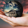Hand holding sphere of GUGG