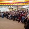 An audience sitting in chairs
