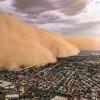 Dust storm engulfing city