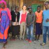 Group of 7 people posing in Africa