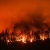 Wildfire showing a mountainside burning