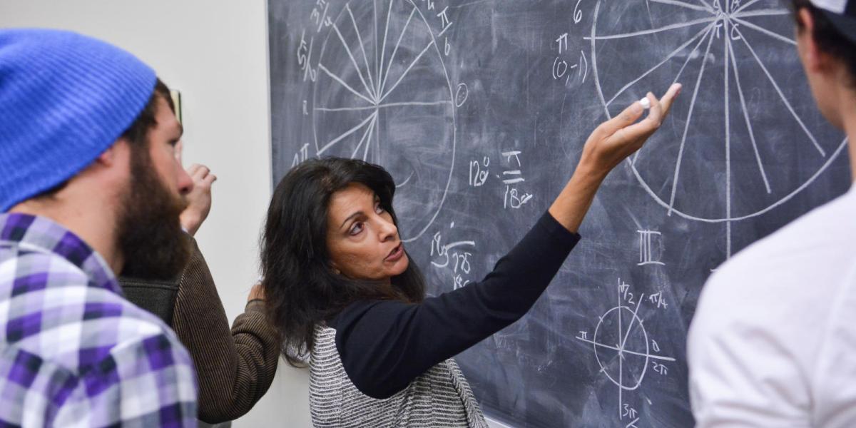 Teacher with students