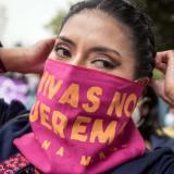 A woman participates in a march against gender violence in Quito, Ecuador.