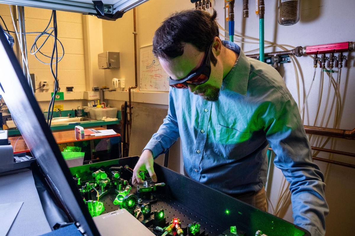 Researcher in JILA lab