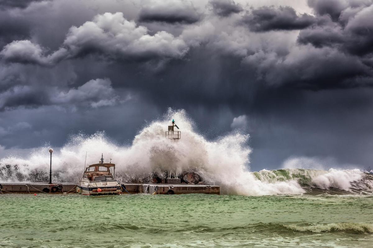 Waves crashing on dock
