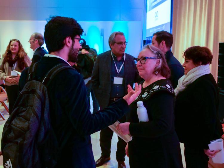 Sheila Watt-Cloutier talks with audience members after her keynote address.