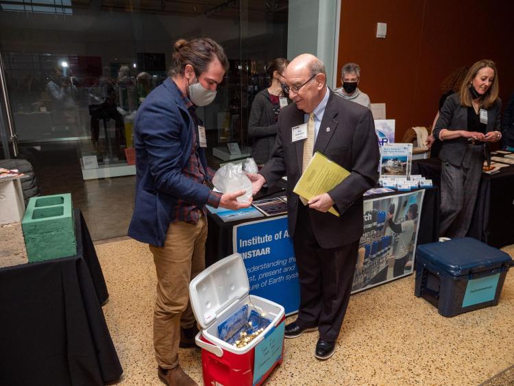 Chancellor Philip P. DiStefano talks with Brad Markle.