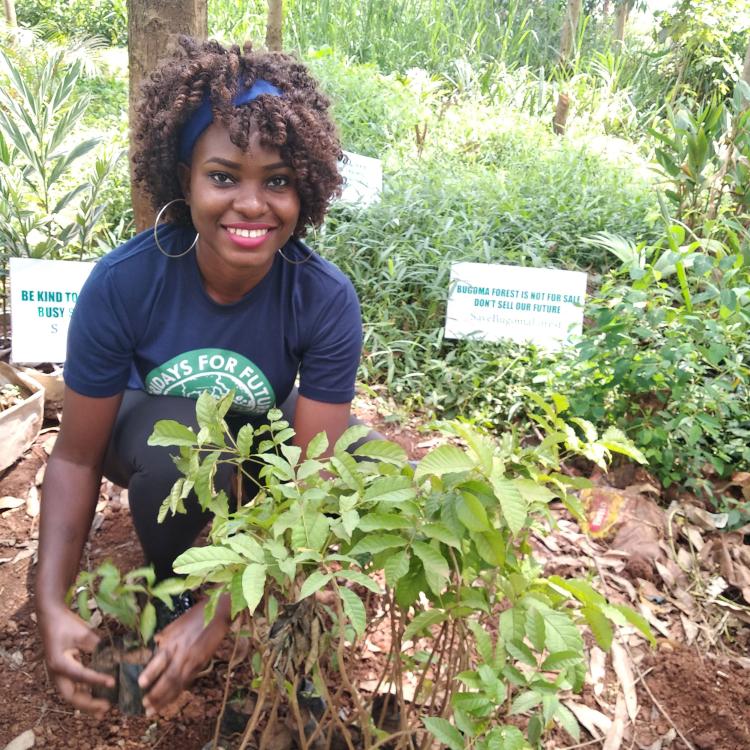 Hilda Flavia Nakabuye planting