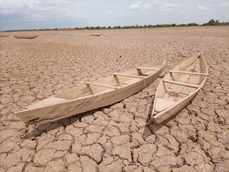 Boats on dried lakebed