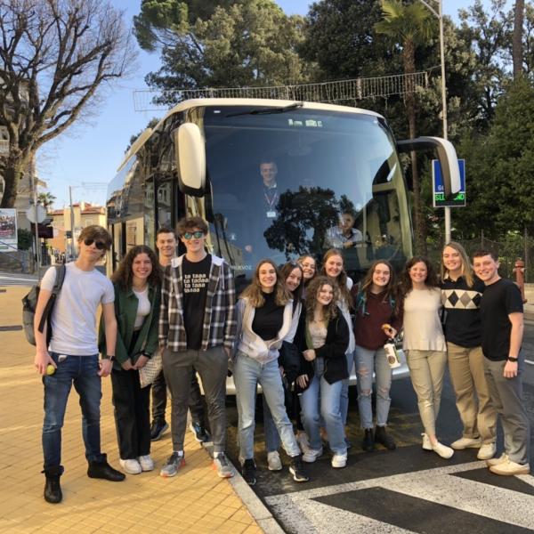 Students in front of Tour bus