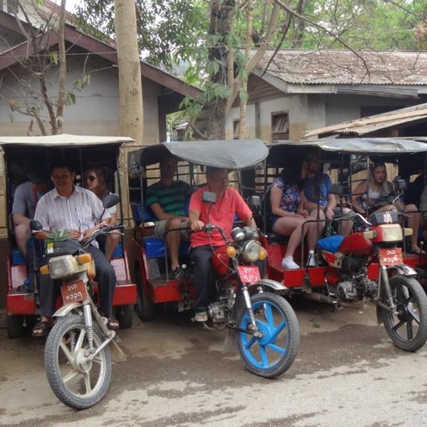 Tuk Tuks in the market in Burma