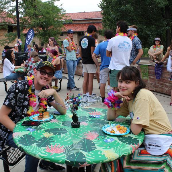 Student's eating at the Luau 