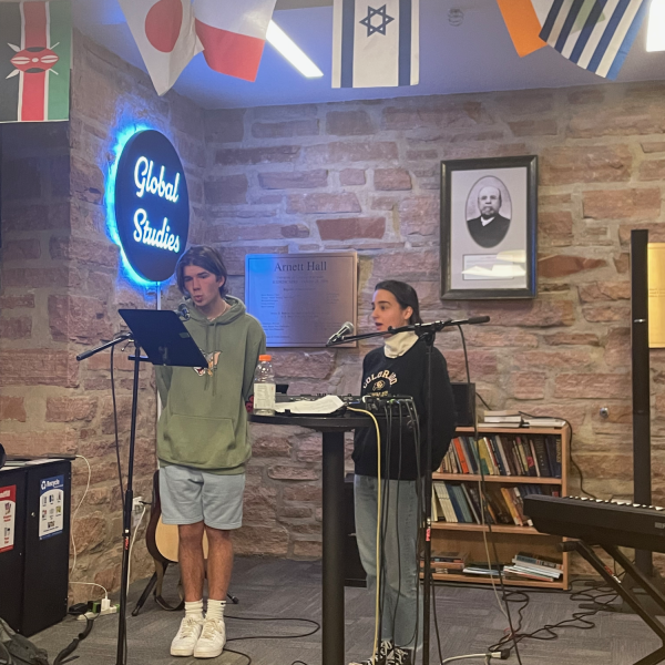 Students singing at open mic night 