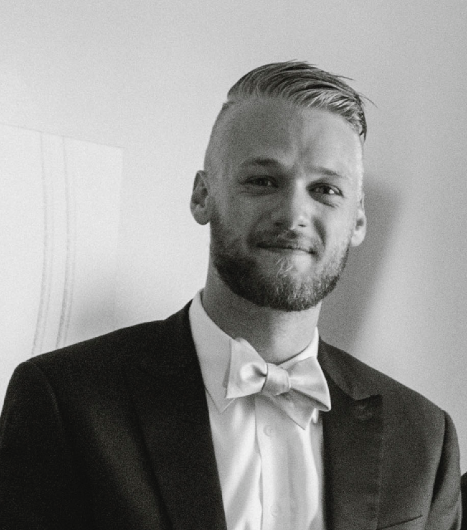 Black and white headshot of Anthony