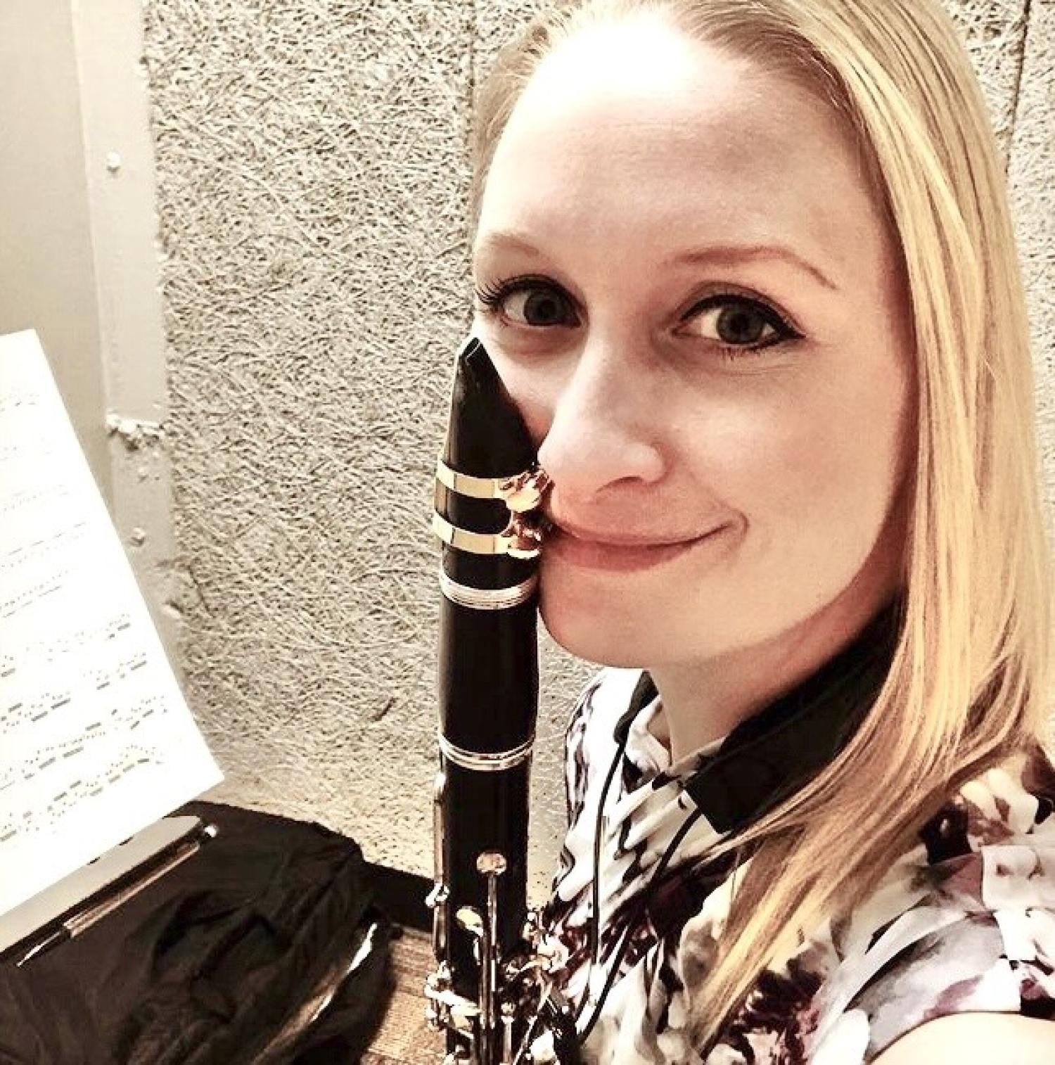 Picture of Gentry posing with a clarinet