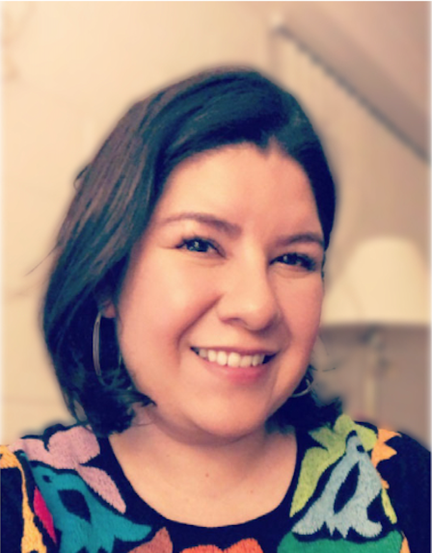 Headshot of María