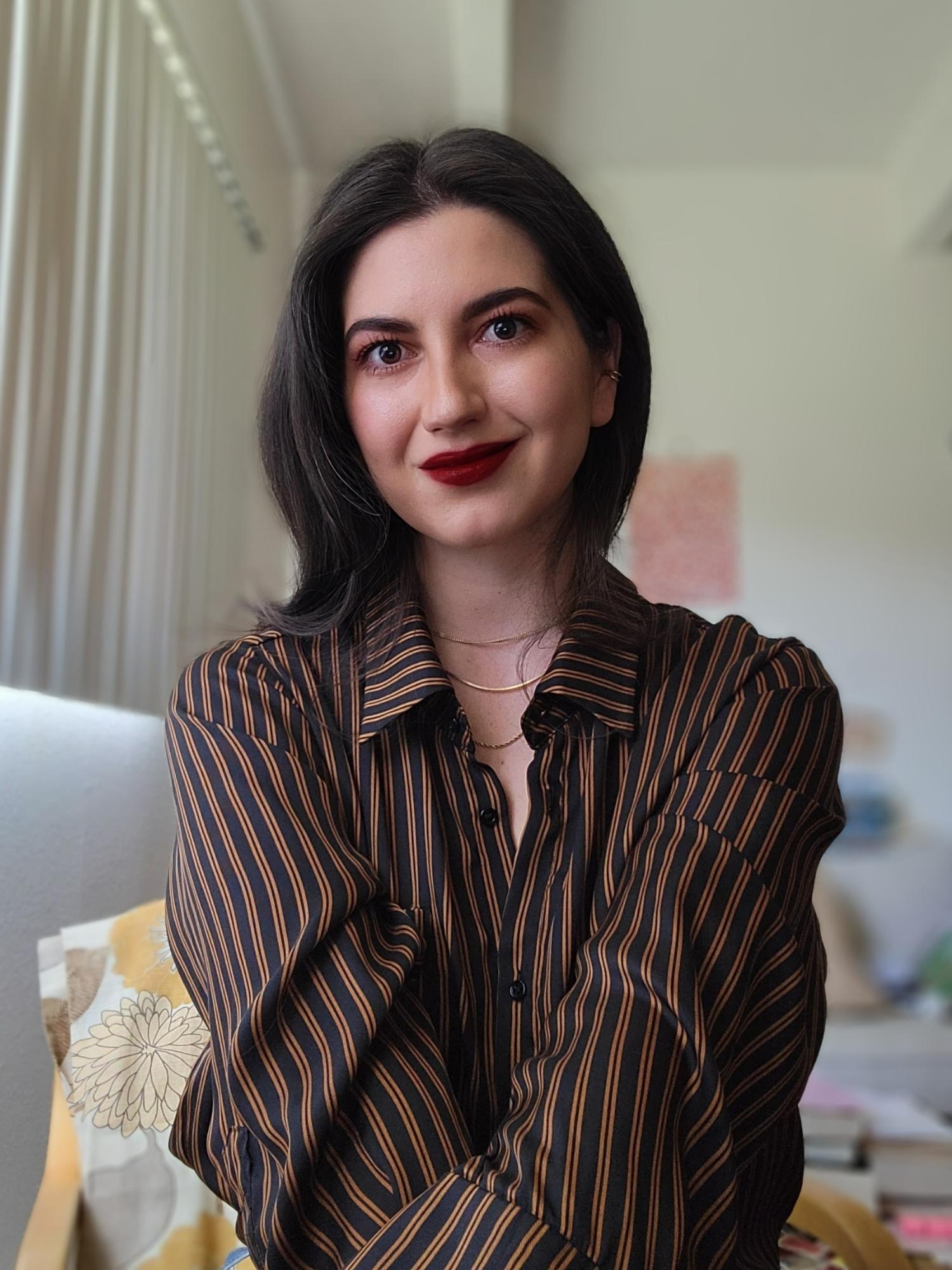 Headshot of Paige in an office setting