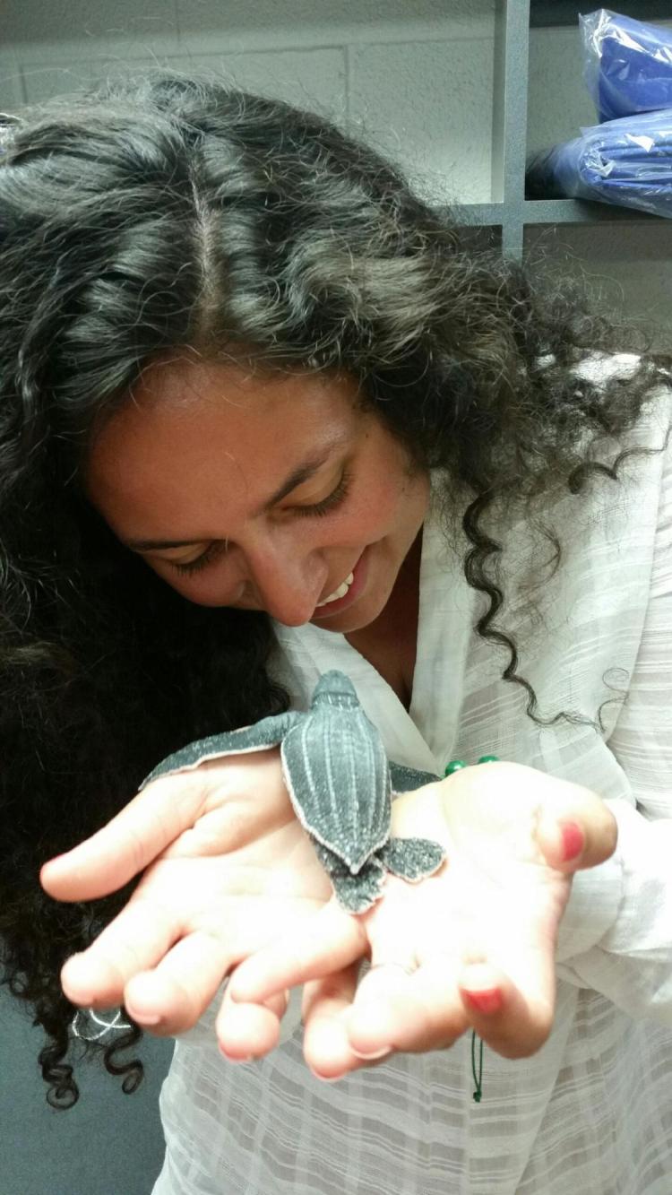 Jo holding a baby turtle