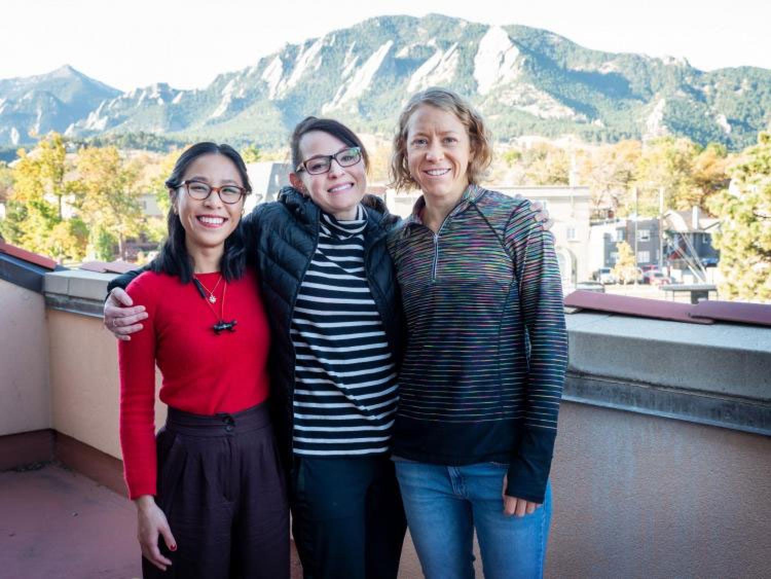 Director of Graduate Community and Program Development Leslie Blood, center, with doctoral students Shirley Huang, left, and Erin Connor, right